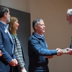 Staff member receiving sustainability award