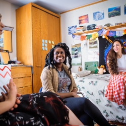 Students hanging out in dorm room