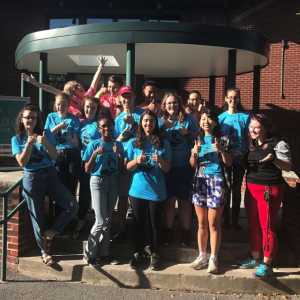 Cornell EcoHouse Residents pose outside of the building in 2019
