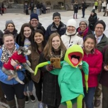 Group of people holding awards